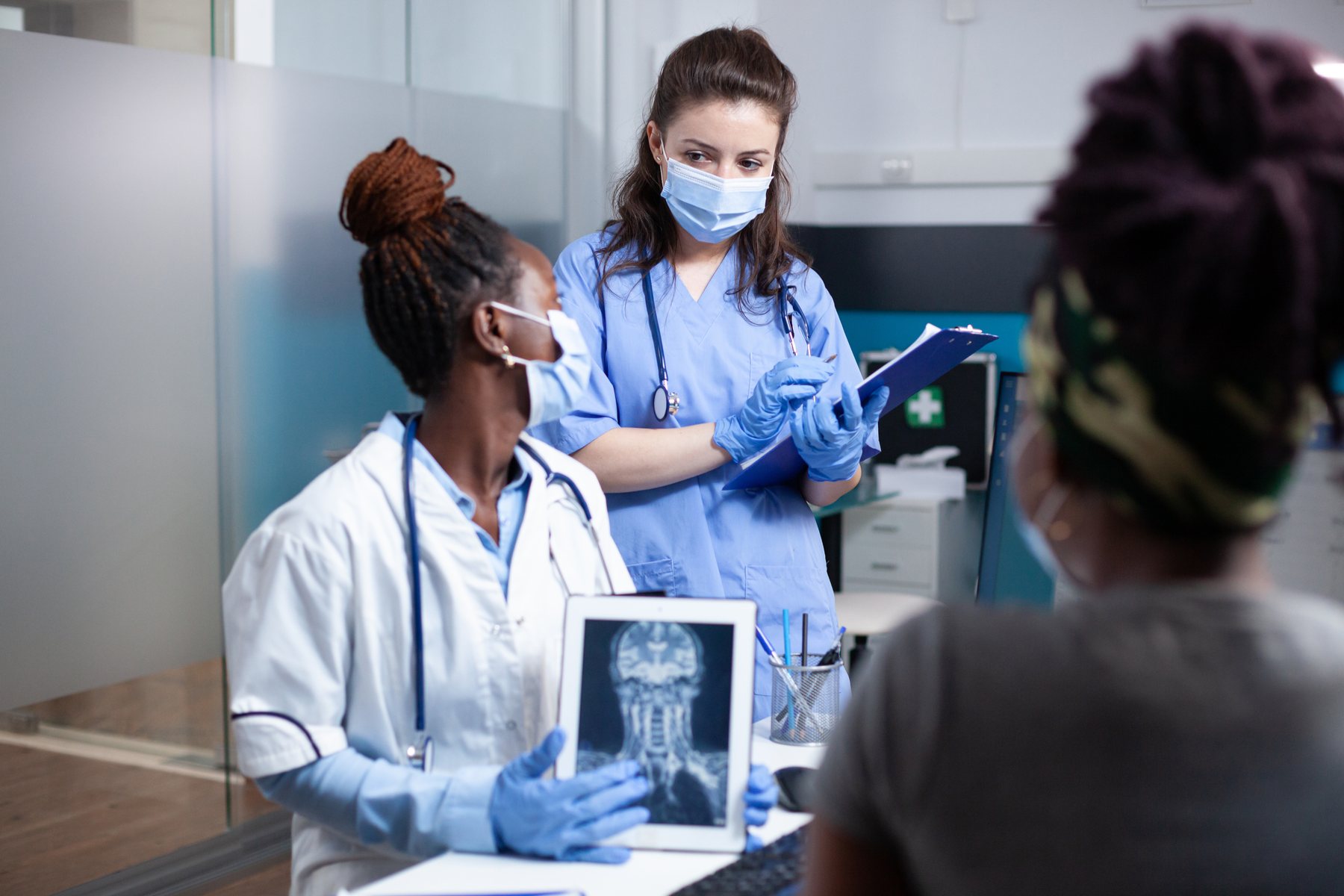 Clinicians in a professional clinical setting